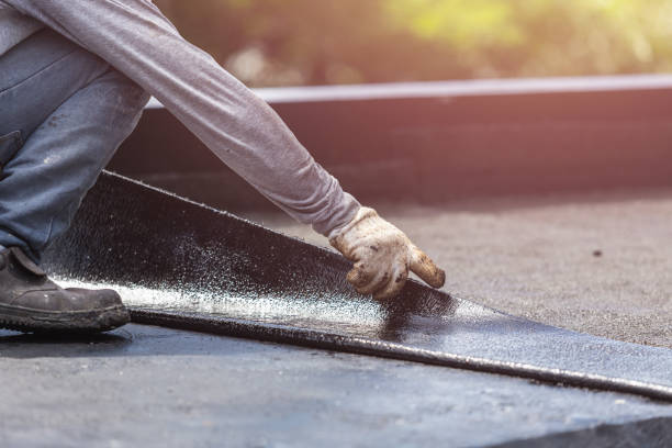Professional Waterproofing technician working in Locust Valley, NY
